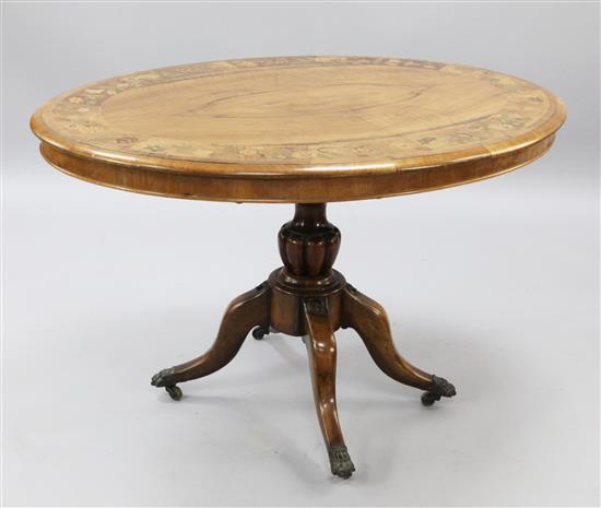 A Victorian inlaid walnut and marquetry oval looe table, W.4ft